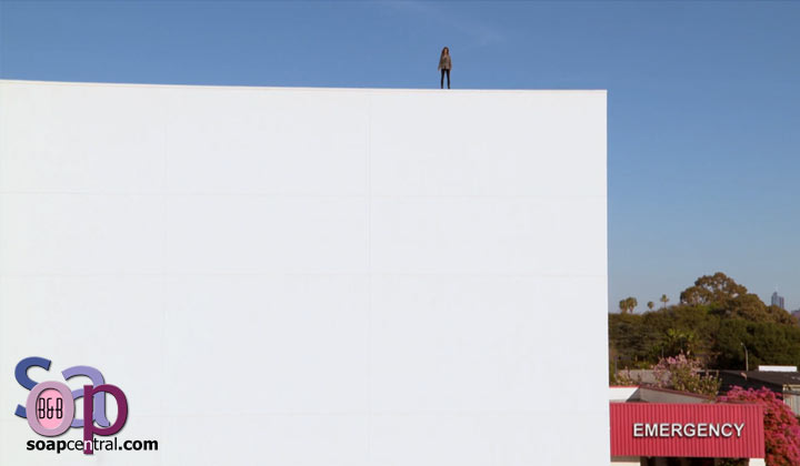 Sheila stands on a ledge, crying out to Finn